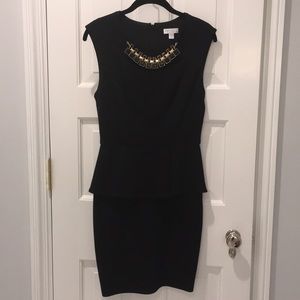 Black peplum Bisou Bisou dress